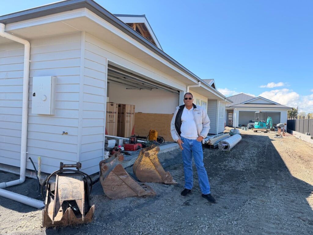 Sanders Muleya inspecting a residential property under construction